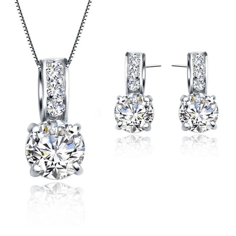 The Imperial Classic: Round-Cut Crystal Pendant & Earring Set